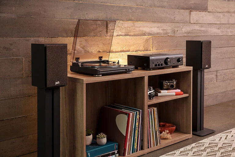 A bundle of Polk bookshelf speakers, a Denon Turntable and Amplifier