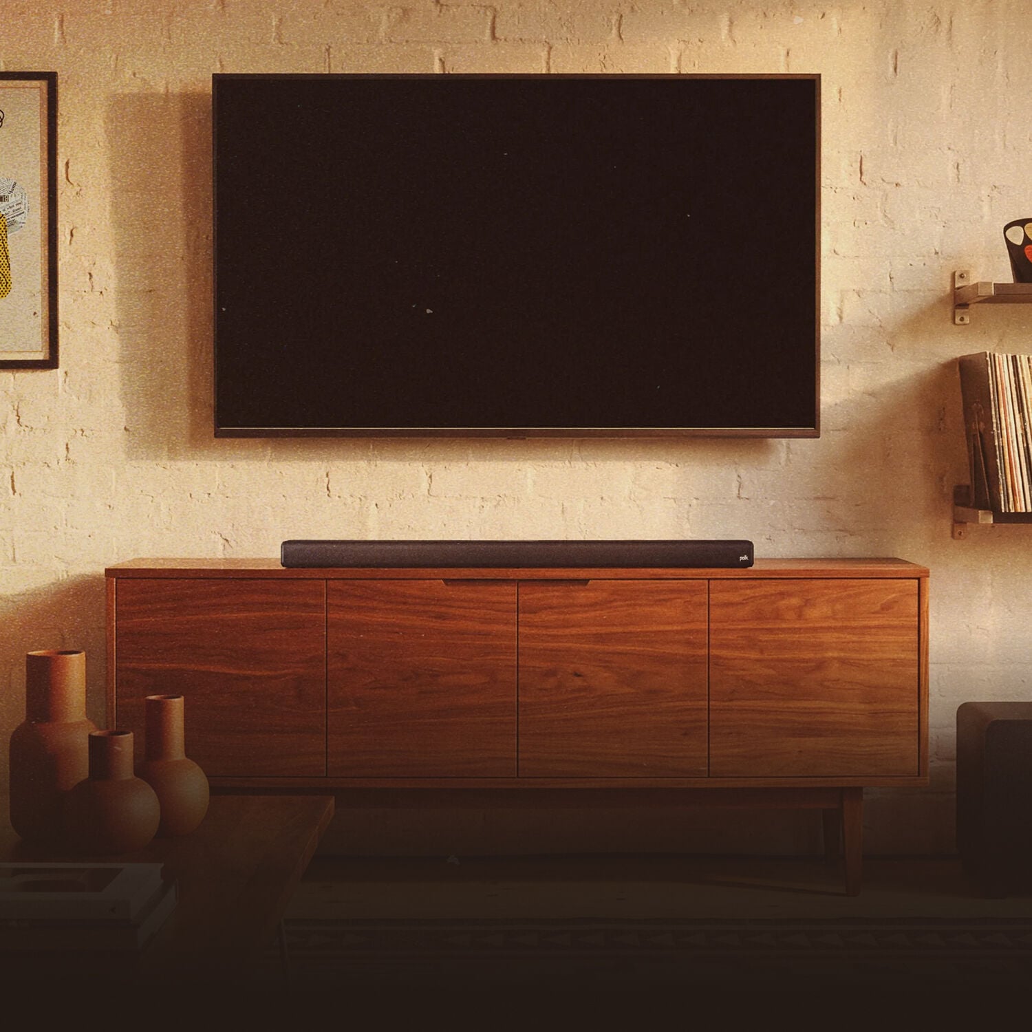 Signa Sound bar and Subwoofer sitting on an entertainment system