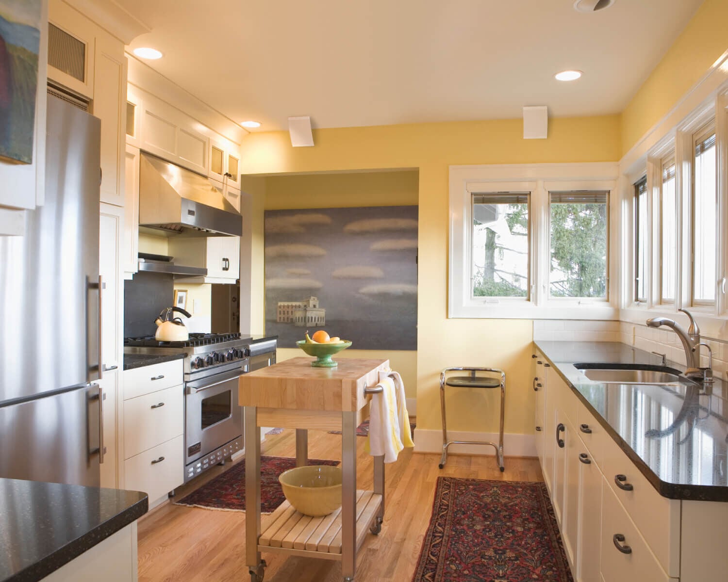 On-wall speakers in a kitchen